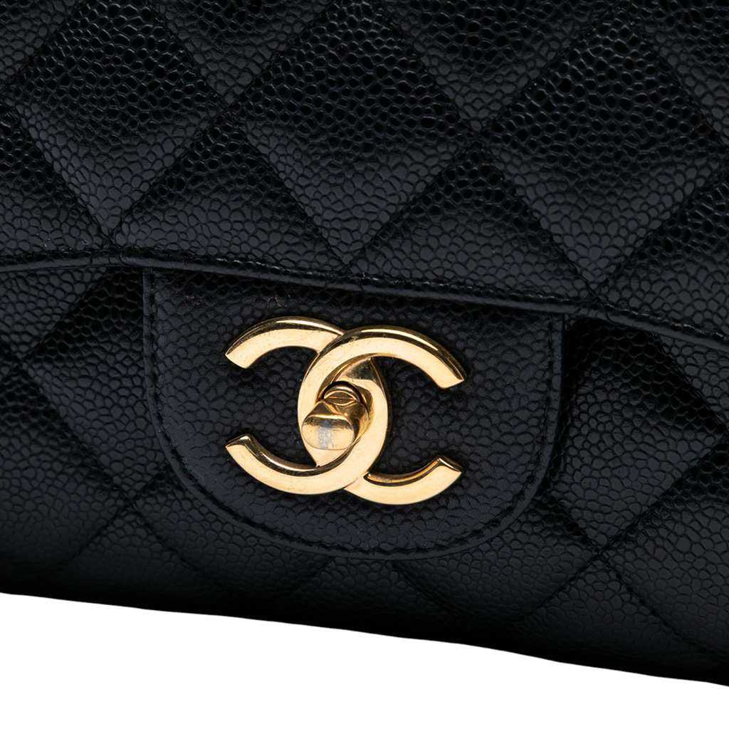 Chanel Maxi Classic Caviar Double Flap - Detail 1