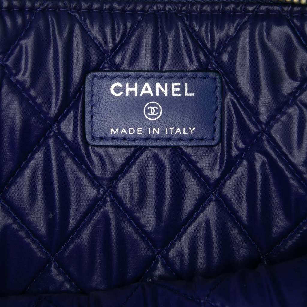 Chanel Medium Quilted Lambskin O Case Clutch - Side view