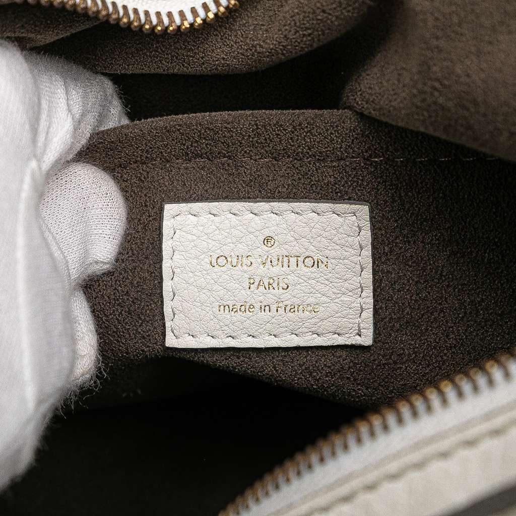 Louis Vuitton Monogram Mahina XS - Side view