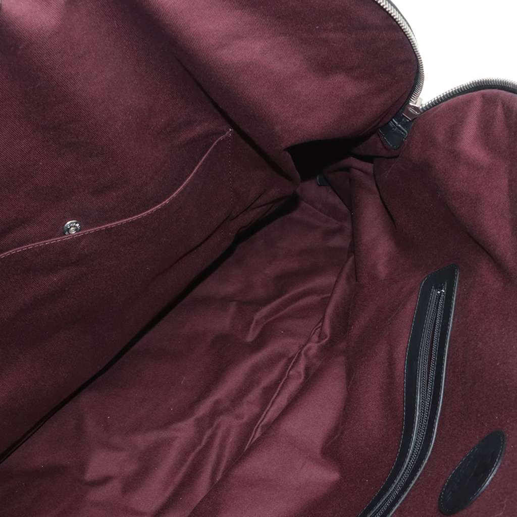 Chanel Quilted Coated Canvas Horizontal Sport Weekender - Side view