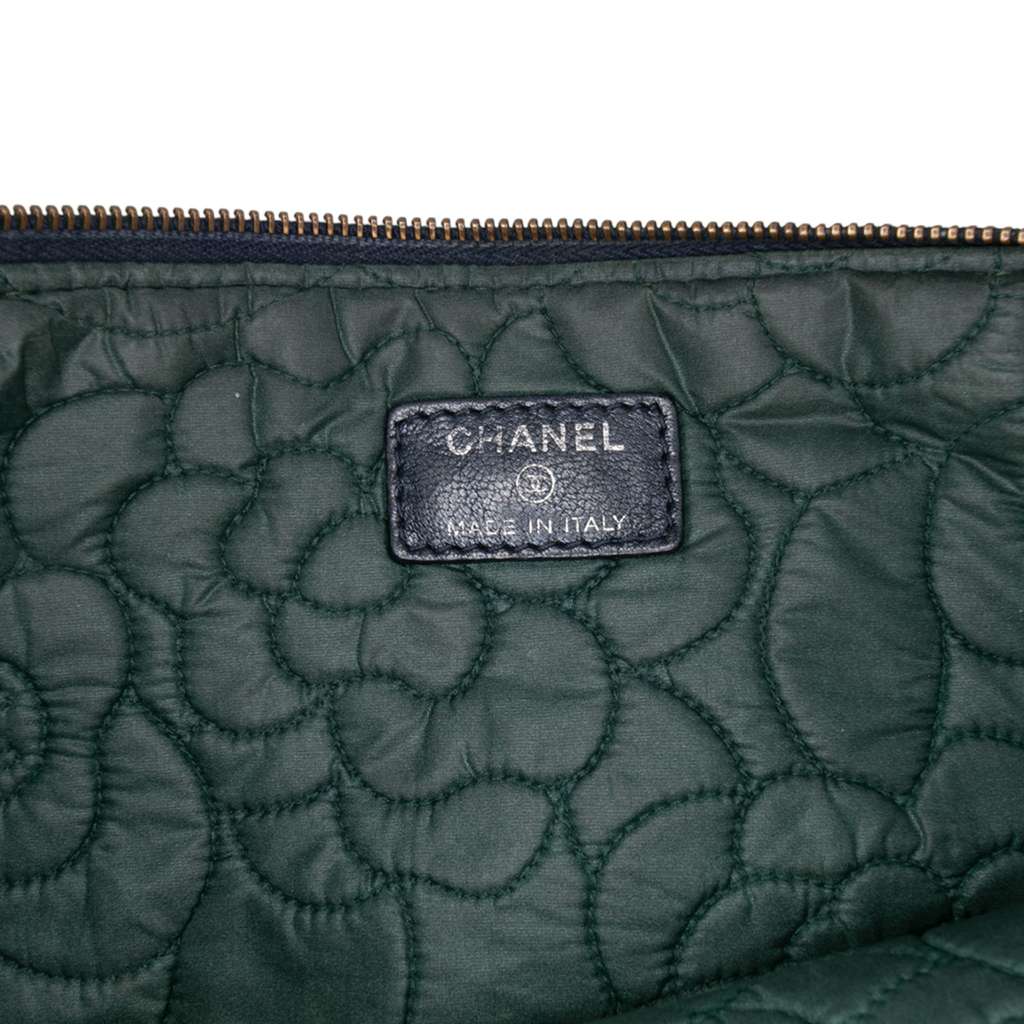 Chanel Large CC Embossed Lambskin Camellia O Case Clutch - Side view
