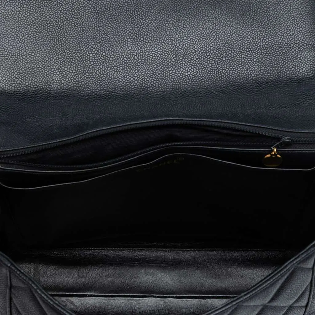 Chanel Jumbo CC Quilted Caviar Kelly Top Handle Bag Black Leather Good - Model View