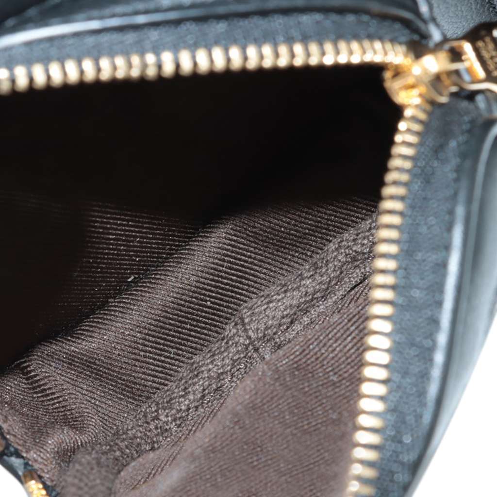 Louis Vuitton Monogram Empreinte Utility Satchel - Side view