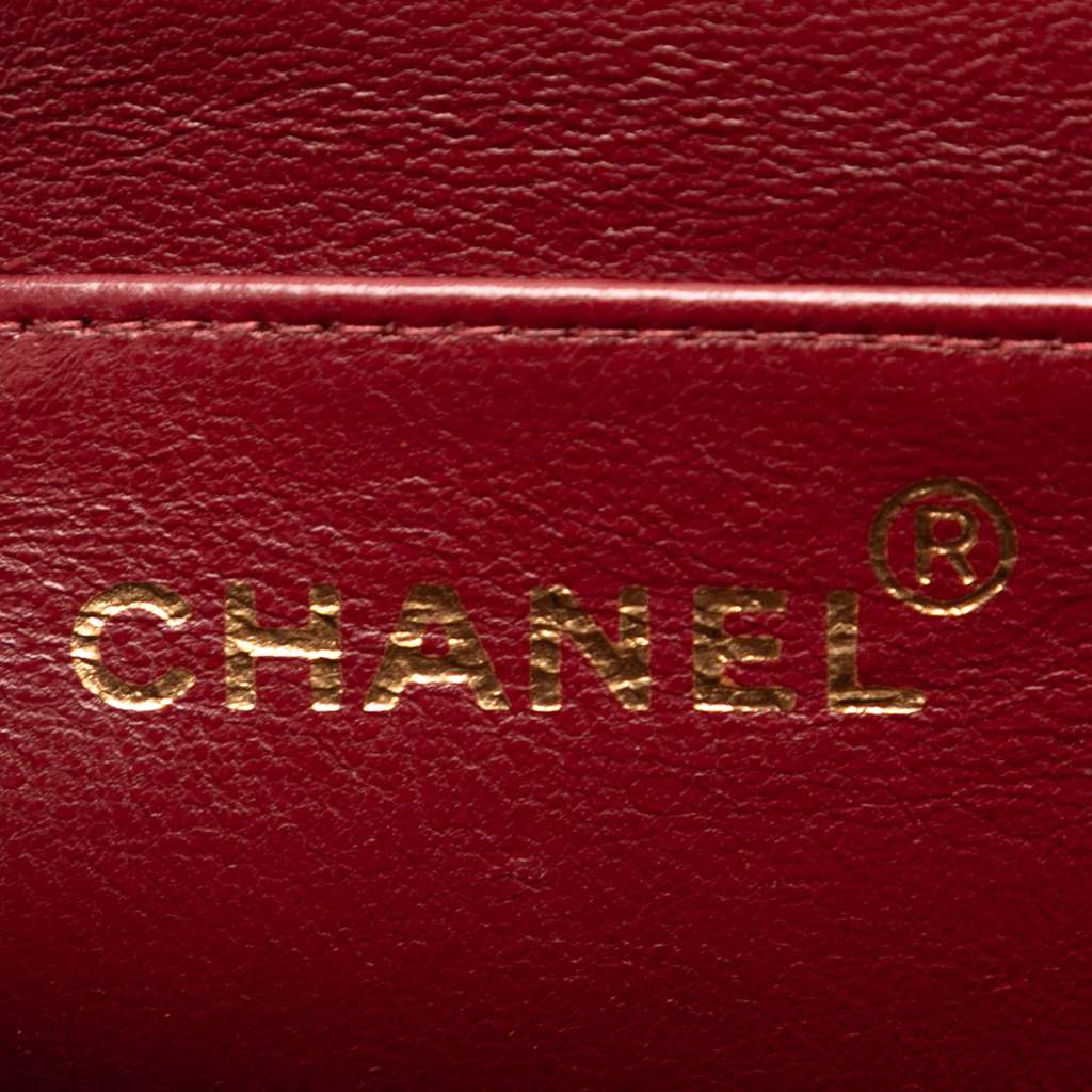 Chanel CC Quilted Lambskin Handbag - Side view