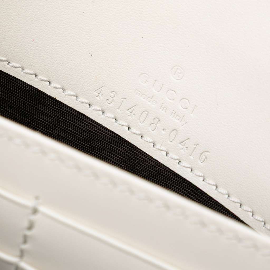 Gucci Mini Guccissima Bow Signature Wallet On Chain - Side view