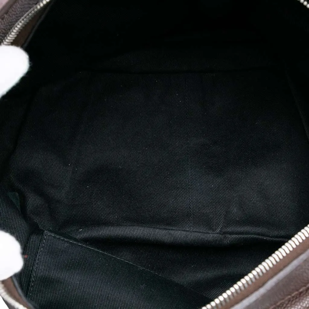 Chanel Large CC Caviar Outdoor Ligne Hobo Brown Leather Good - Model View