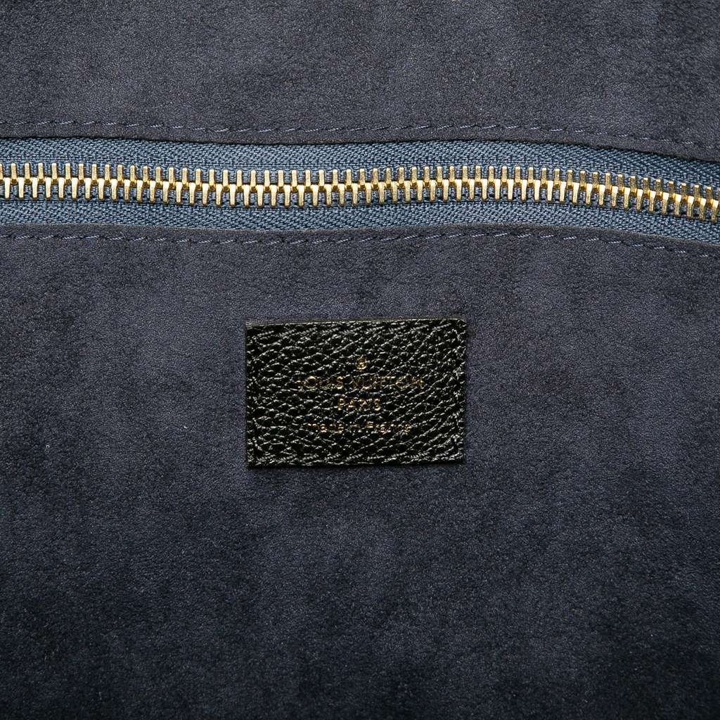 Louis Vuitton Monogram Giant Empreinte Neverfull MM - Side view