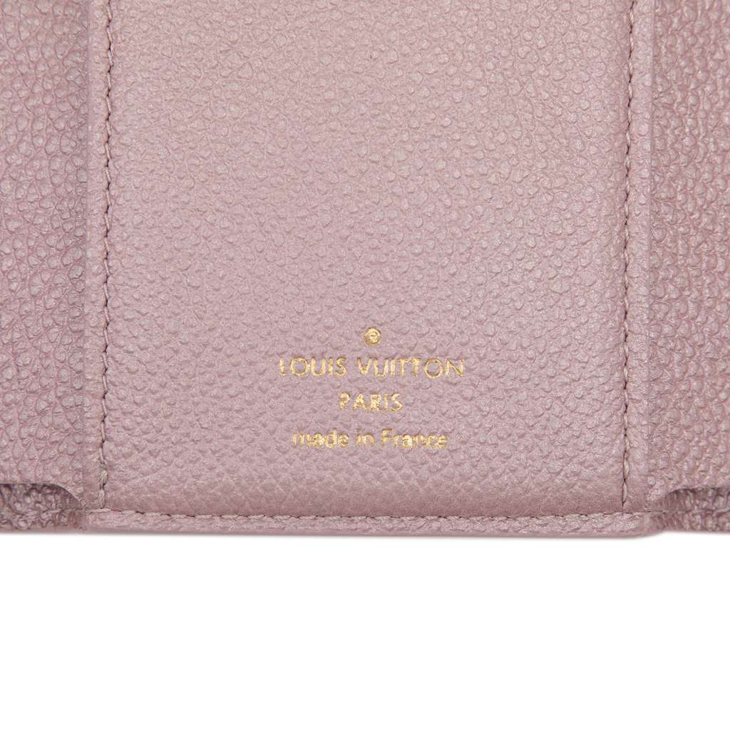 Louis Vuitton Monogram Empreinte Flower Victorine Wallet - Side view