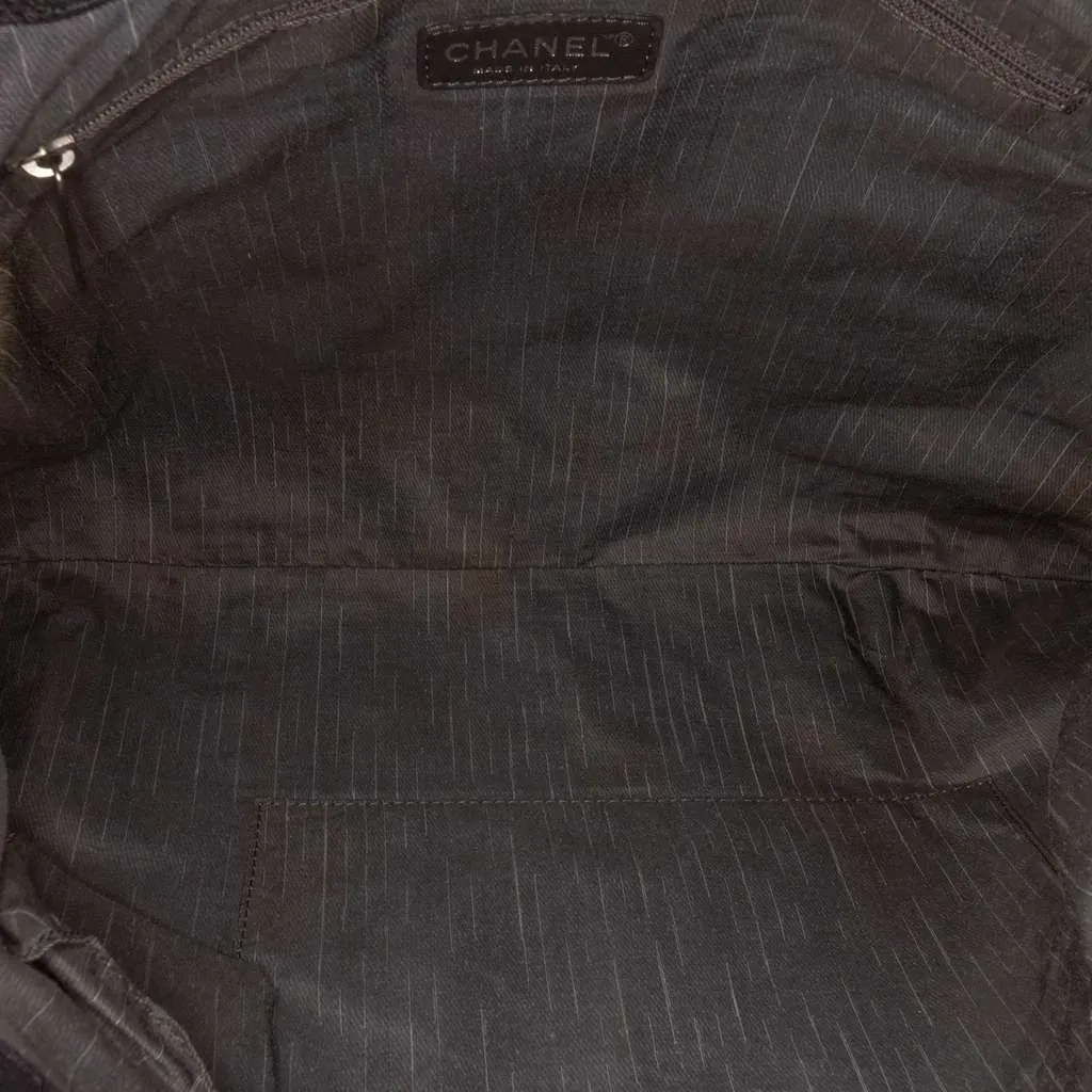 Chanel Washed Calfskin CC Cup Drawstring Tote Black Leather Good - Model View