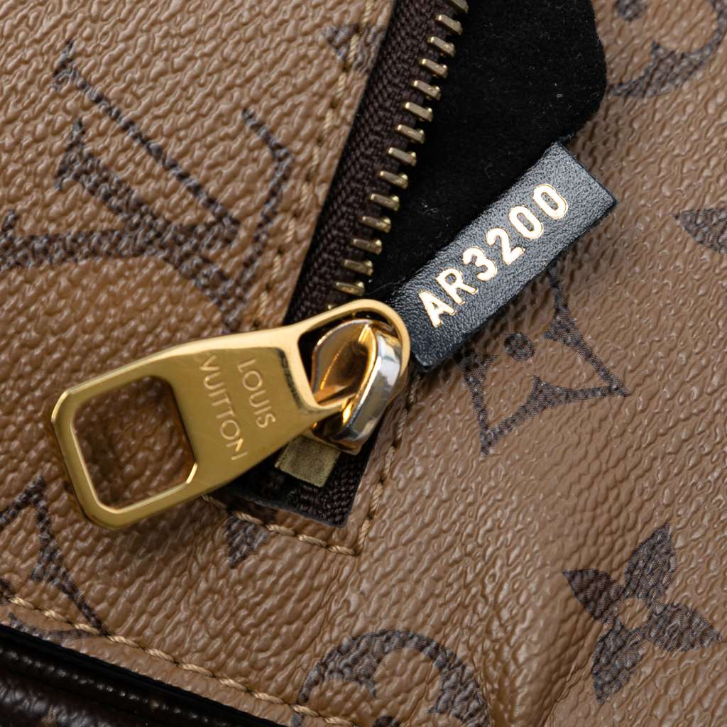 Louis Vuitton Monogram Reverse Pochette Metis - Side view