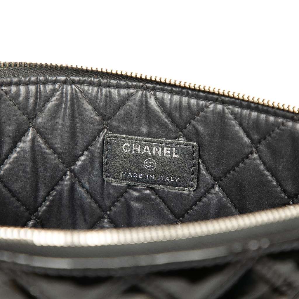 Chanel Medium Quilted Patent O Case Clutch - Side view