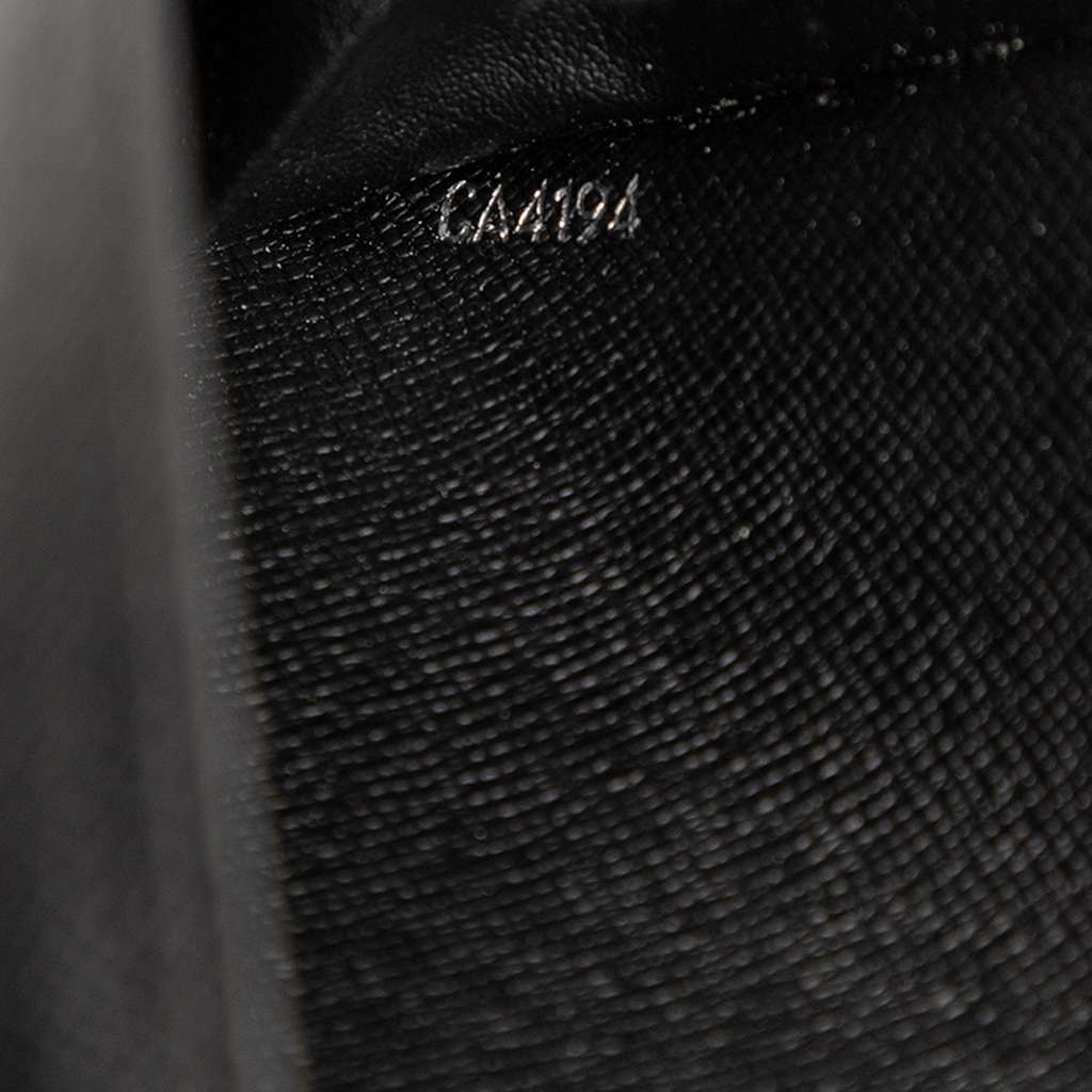 Louis Vuitton Monogram Macassar Vertical Zippy Wallet - Detail 2