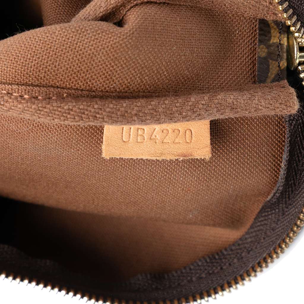 Louis Vuitton Monogram Mini Pochette Accessoires - Detail 1