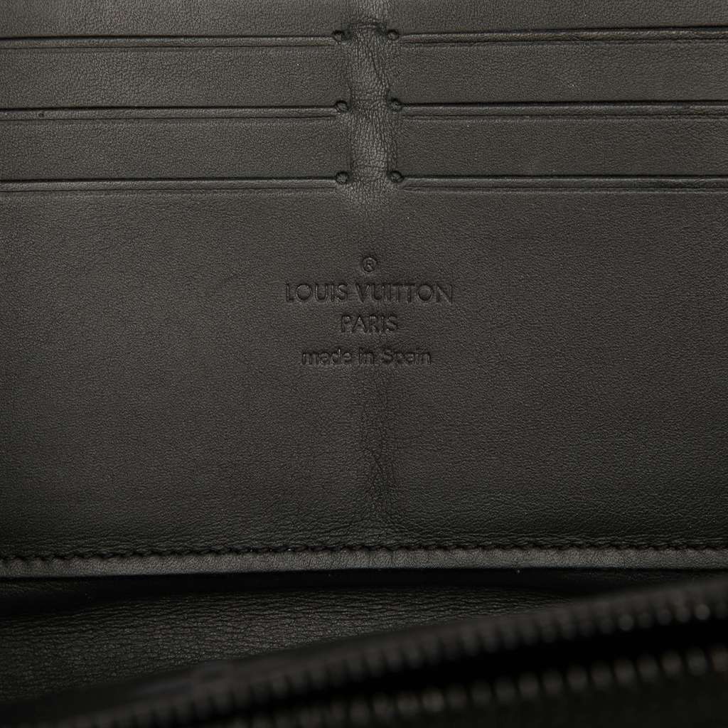 Louis Vuitton Monogram Eclipse Trunk Zippy Wallet - Side view