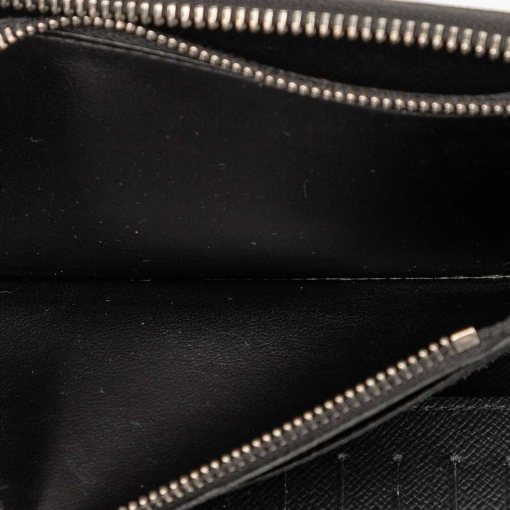 Louis Vuitton Monogram Eclipse Vertical Zippy Wallet - Side view