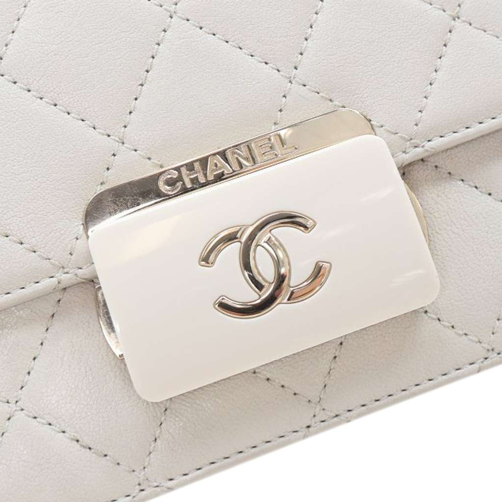 Chanel Mini Lambskin Beauty Lock Flap - Side view