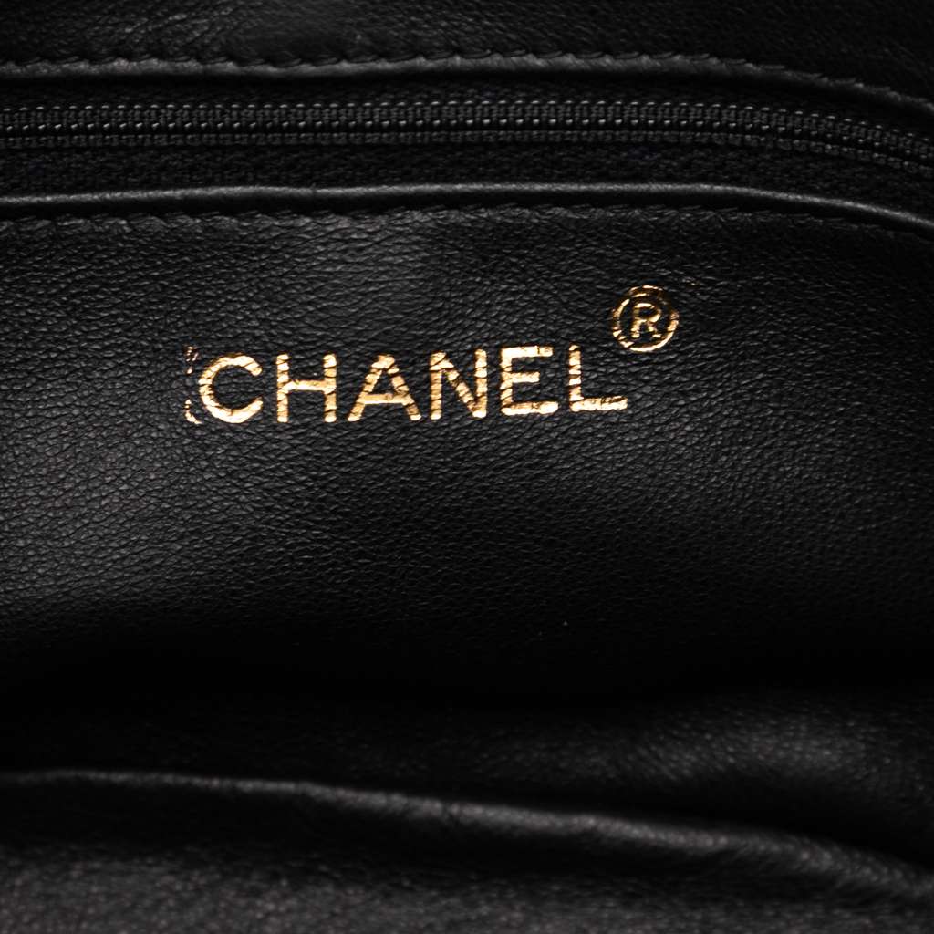 Chanel CC Quilted Lambskin Tassel Vanity Bag - Side view