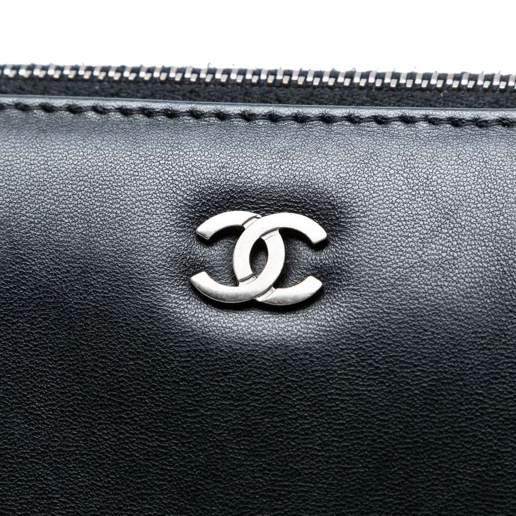 Chanel Large Lambskin and Quilted Patent O Case Clutch - Side view