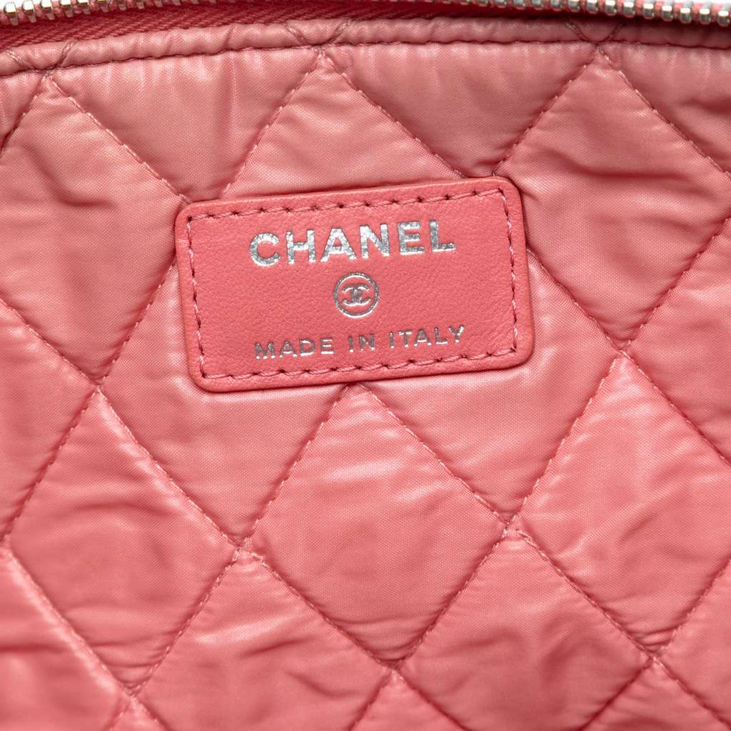 Chanel Medium Quilted Lambskin O Case Clutch - Side view
