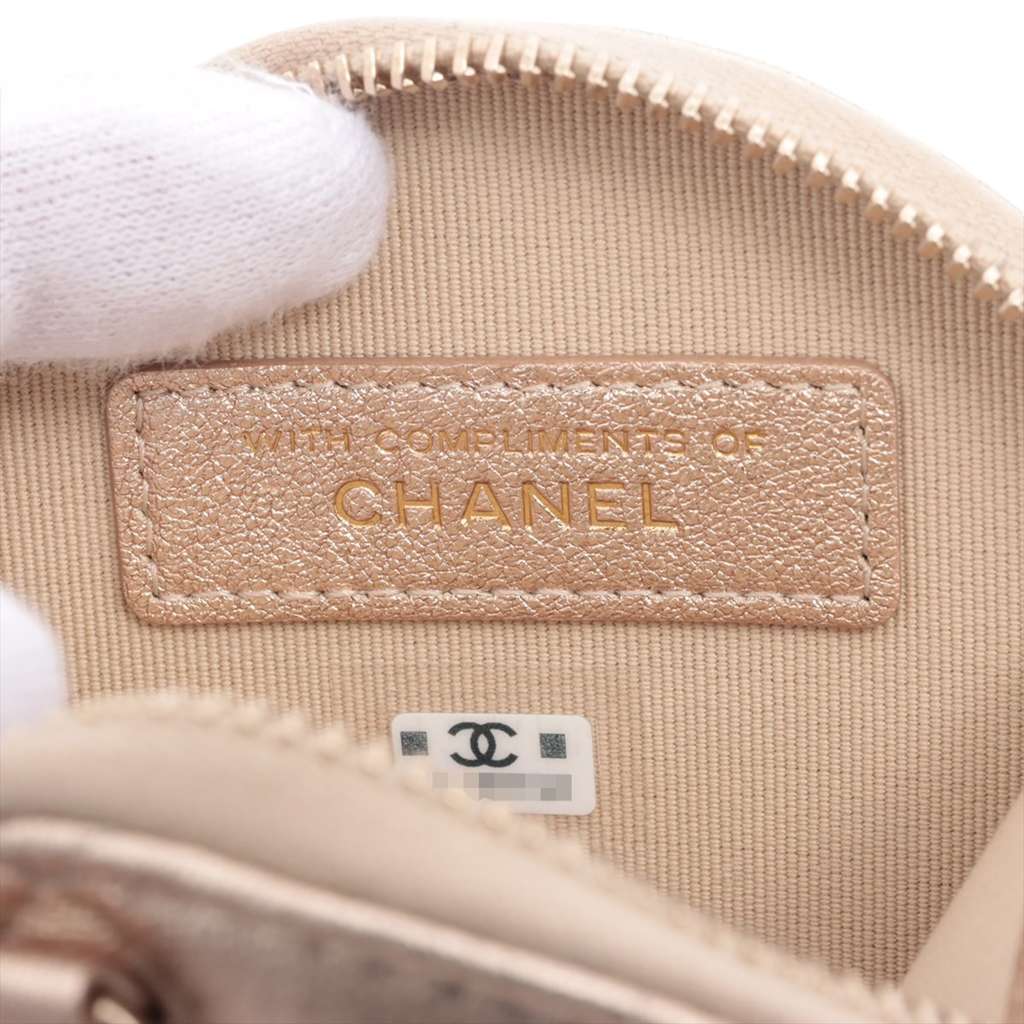 Chanel Quilted Metallic Lambskin Round Clip On Coin Purse and Airpods Case - Side view