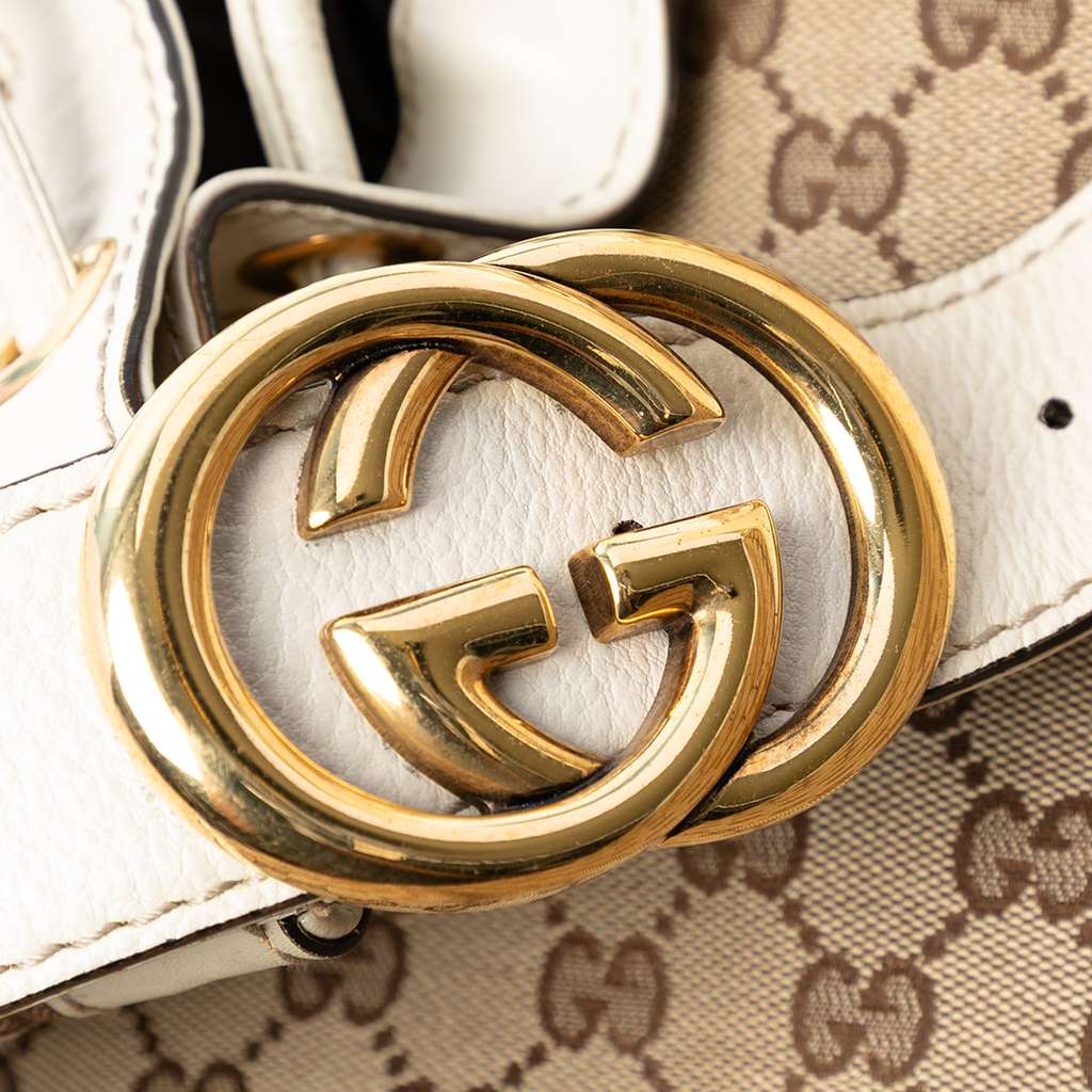 Gucci GG Canvas Interlocking Icon Drawstring Hobo - Side view