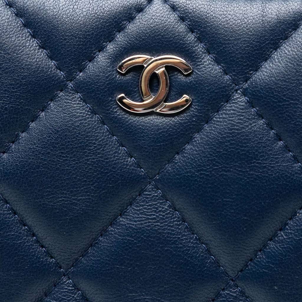 Chanel Large Quilted Lambskin O Case Clutch - Side view