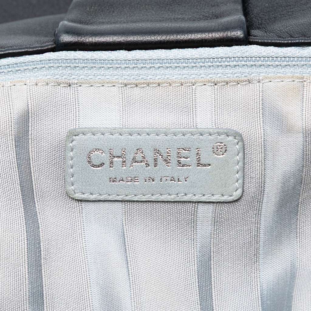 Chanel CC Lambskin Disc Bon Bon Flap - Side view