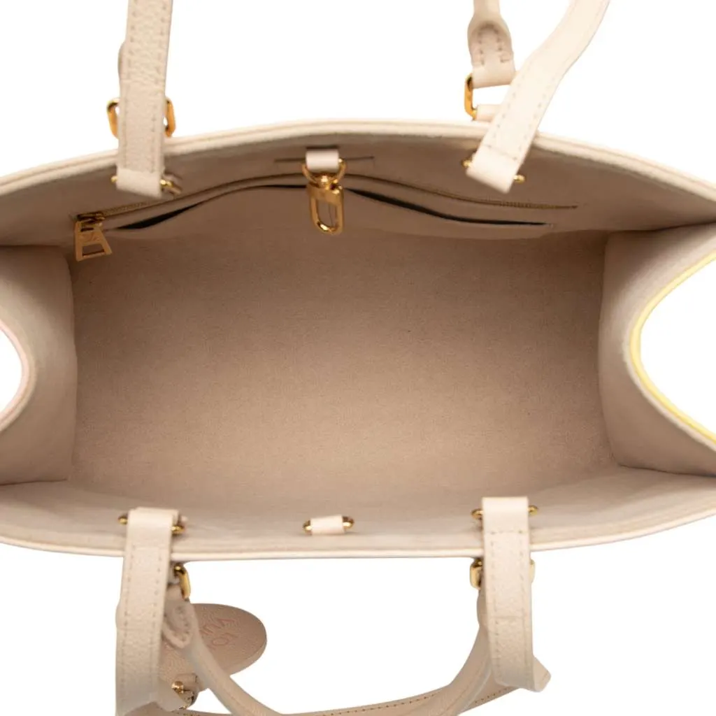 Louis Vuitton Monogram Empreinte Spring In The City Onthego MM Brown Leather Very good - Model View