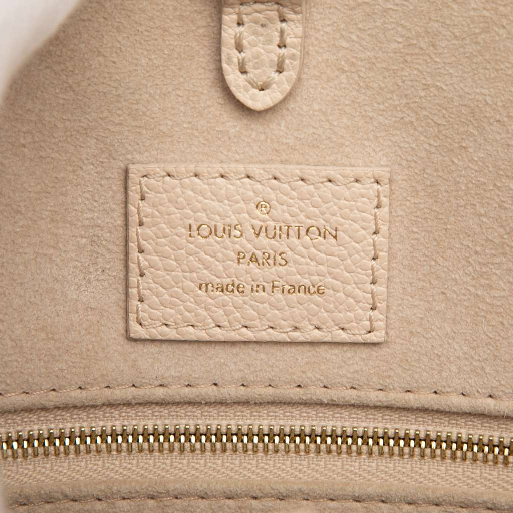 Louis Vuitton Monogram Empreinte Spring In The City Onthego MM - Side view