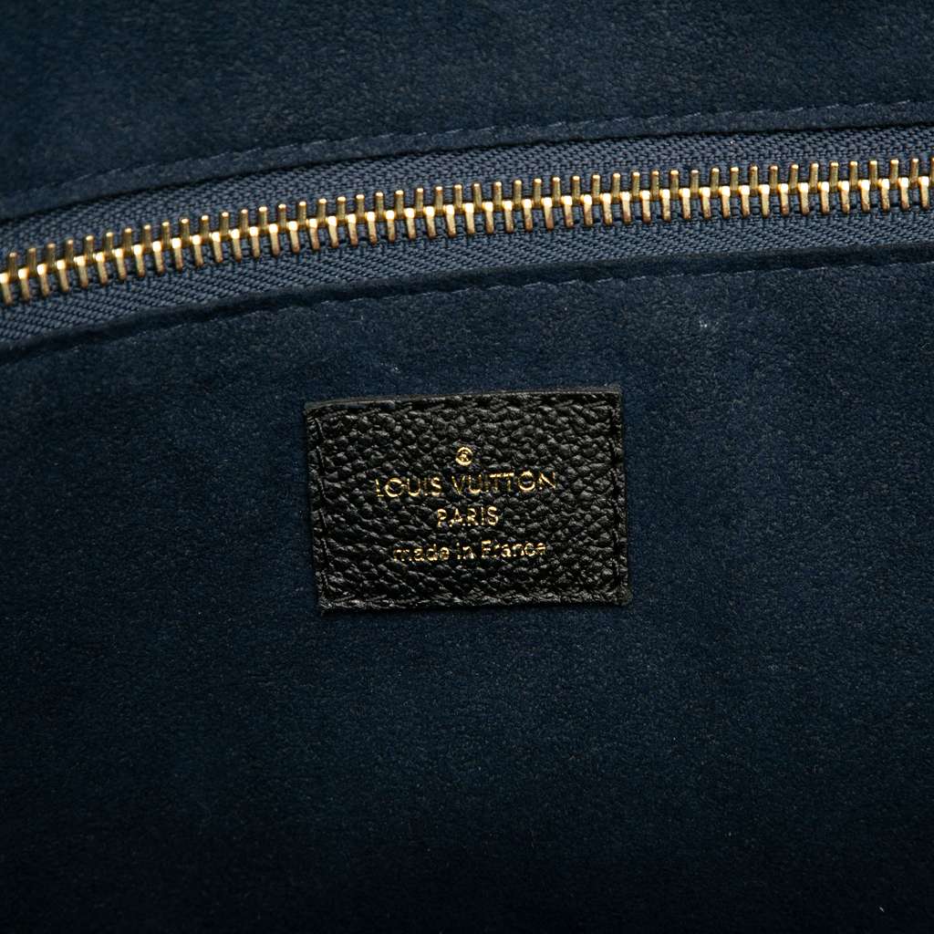 Louis Vuitton Monogram Giant Empreinte Neverfull MM - Side view