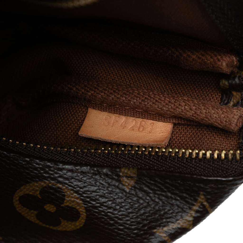 Louis Vuitton Monogram Mini Pochette Accessoires - Side view