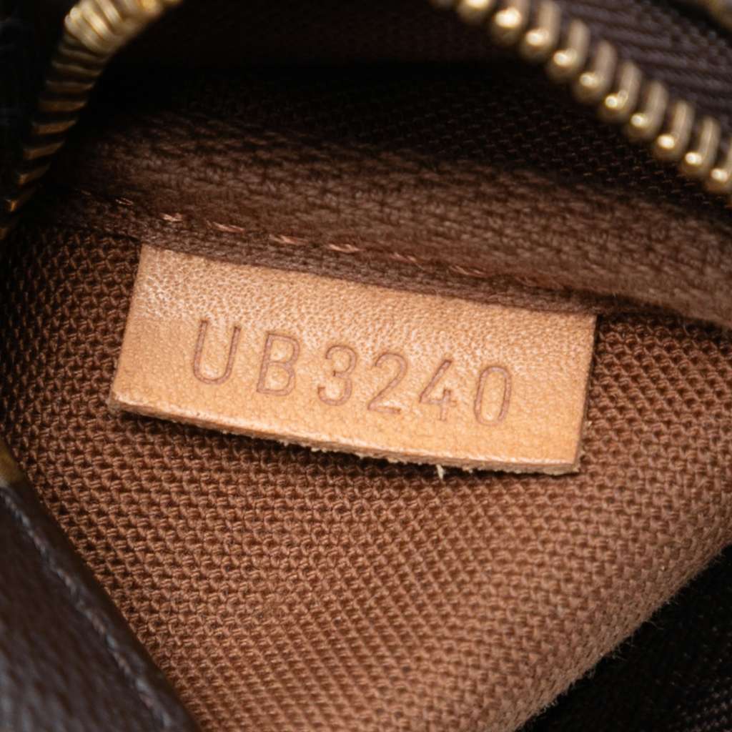 Louis Vuitton Monogram Mini Pochette Accessoires - Side view