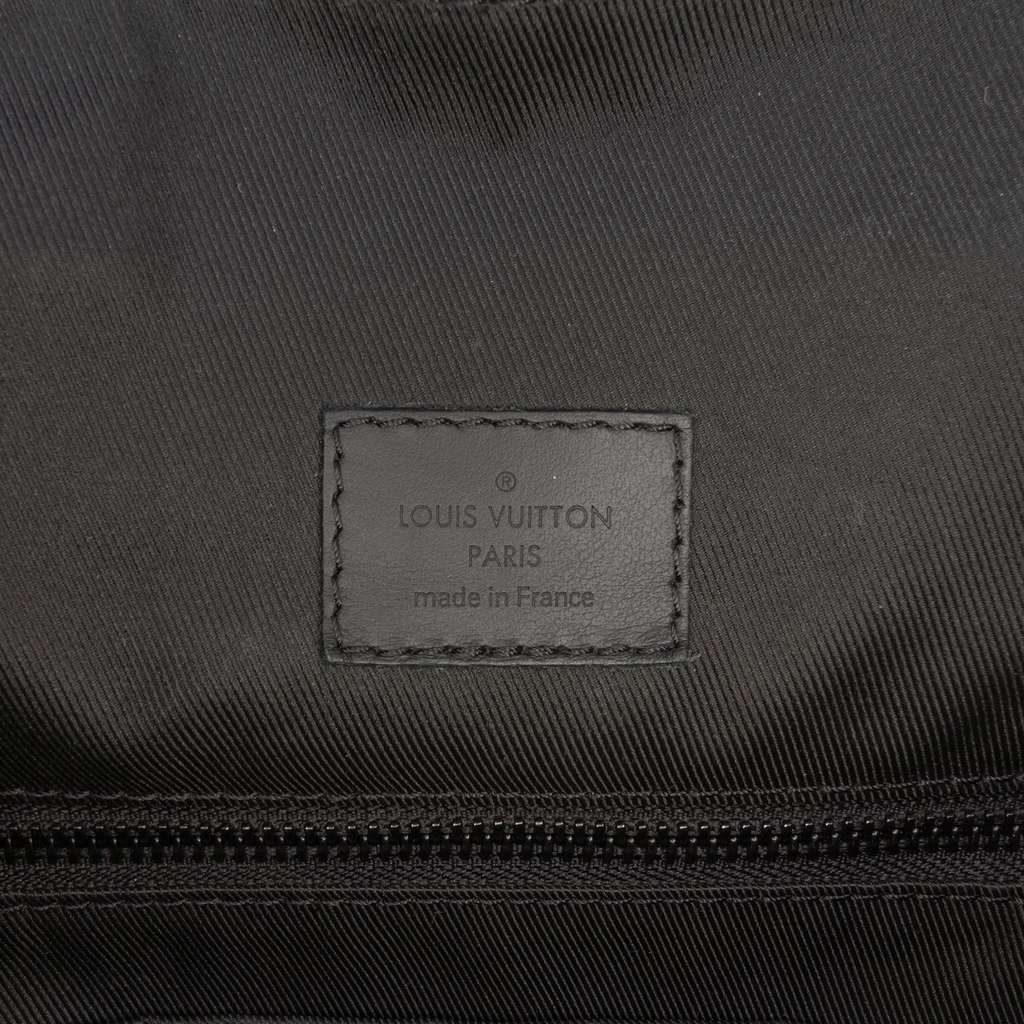 Louis Vuitton Monogram Empreinte Christopher Backpack PM - Side view