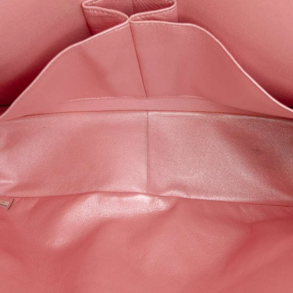 Chanel Jumbo Classic Iridescent Caviar Double Flap Pink Leather Good - Model View