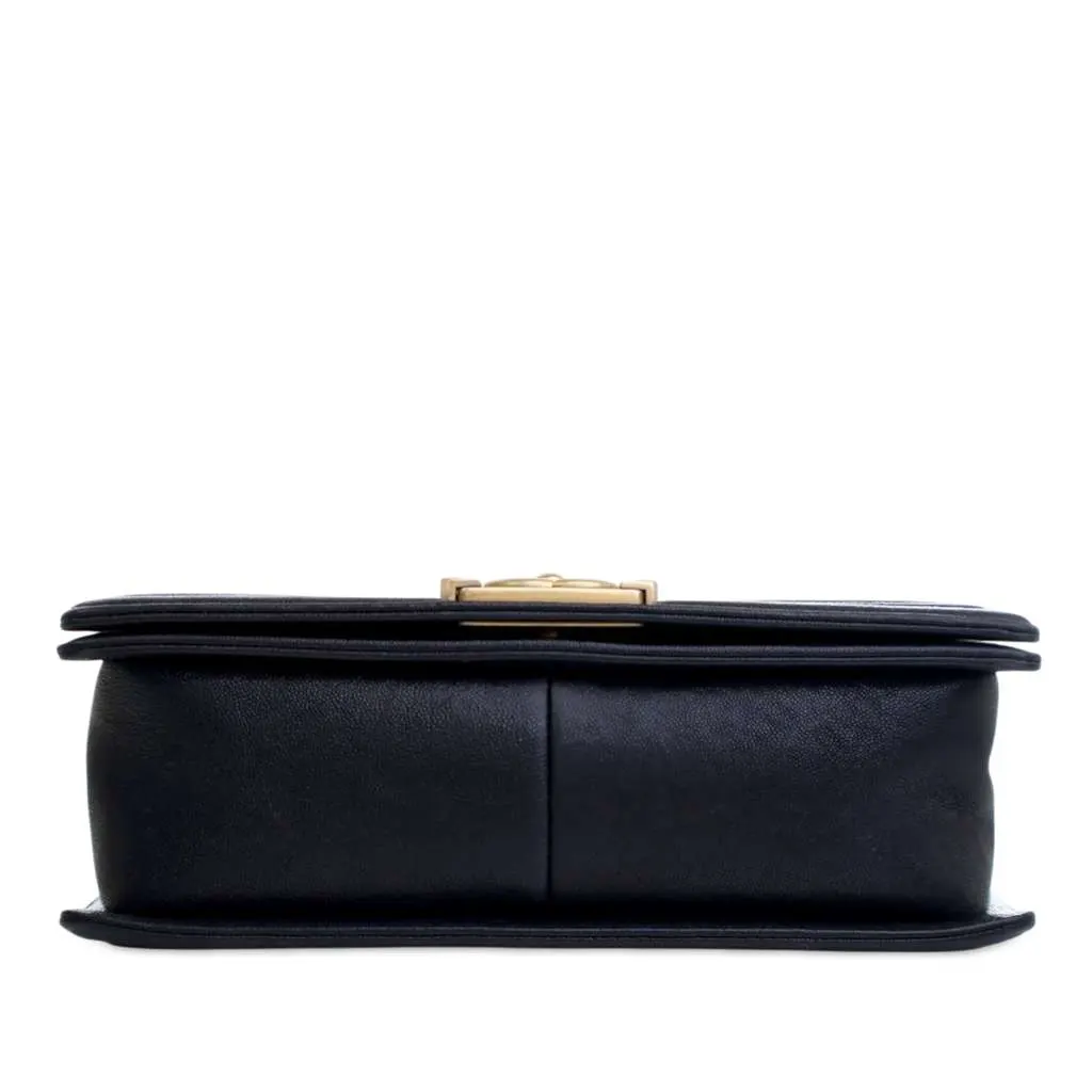 Chanel Old Medium Quilted Caviar Boy Flap Blue Leather Good - Model View