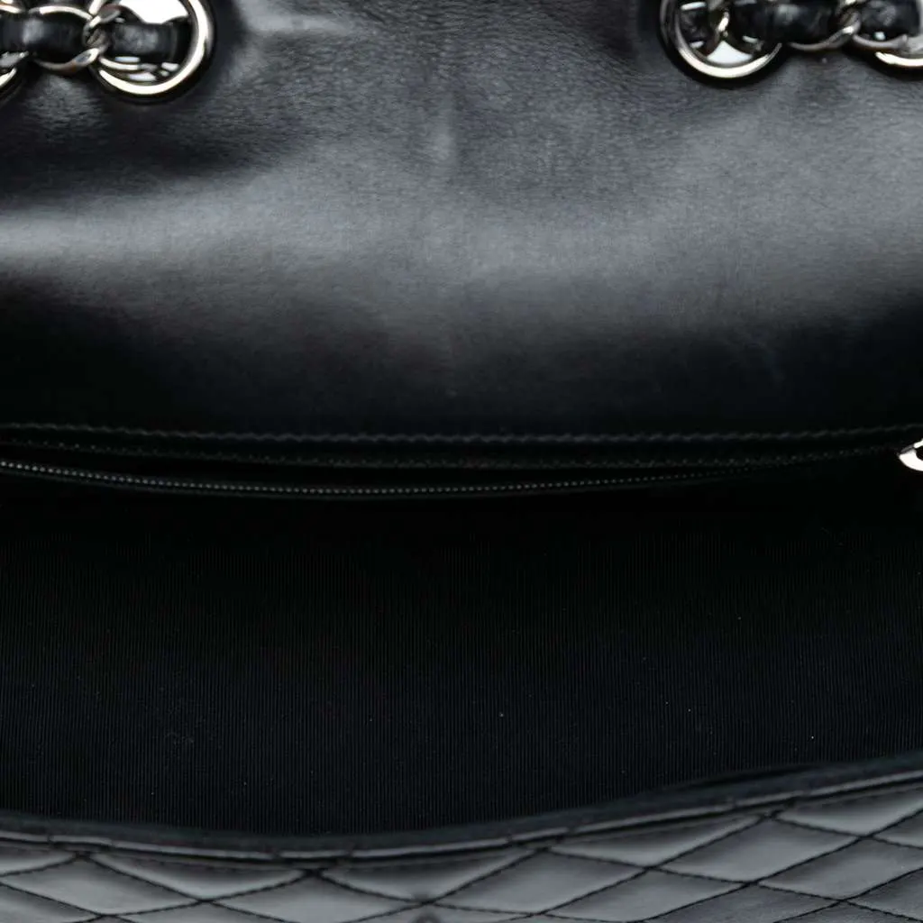 Chanel Small Quilted Lambskin Mademoiselle Chic Flap Black Leather Good - Model View