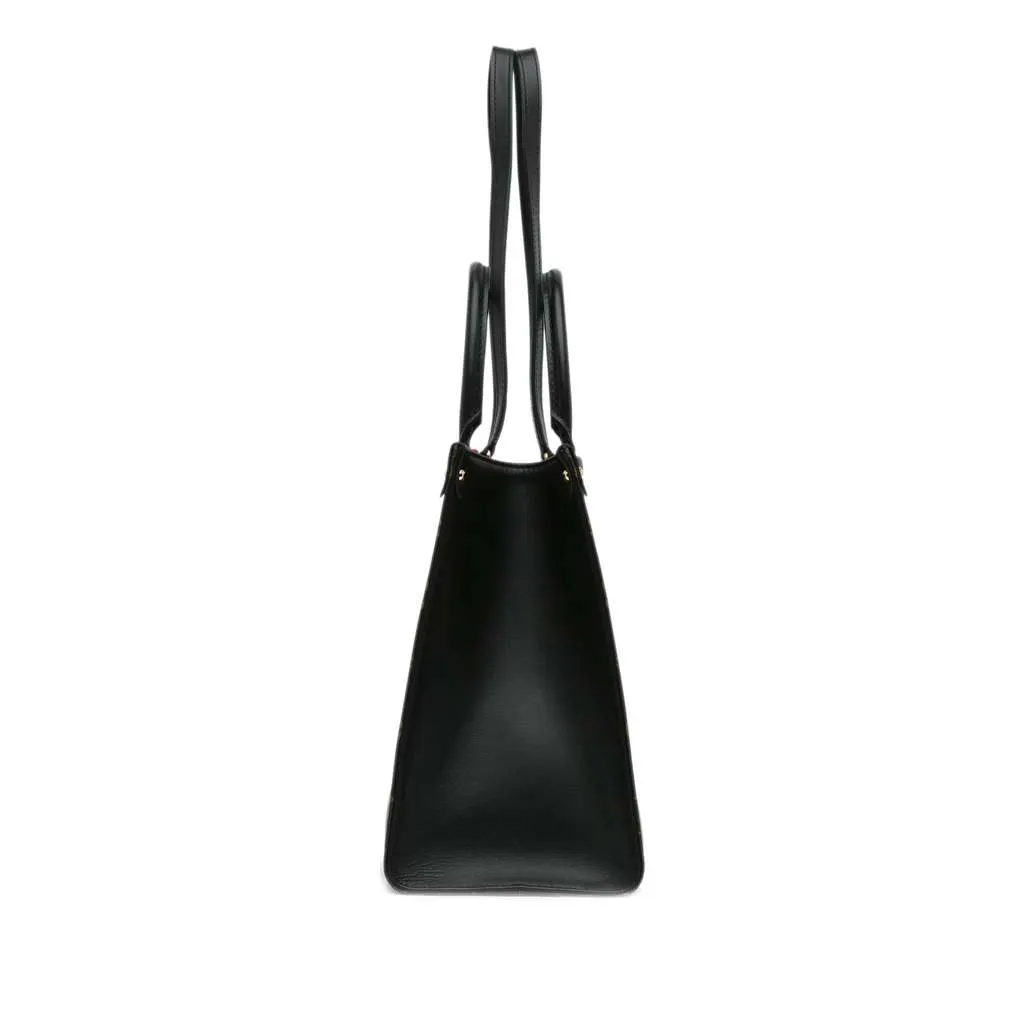 Louis Vuitton Limited Edition Monogram Fall In Love OntheGo Tote MM Brown Canvas Very good - Model View