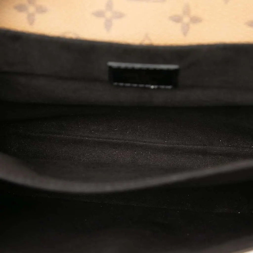 Louis Vuitton Monogram Reverse Pochette Metis Brown Good - Model View