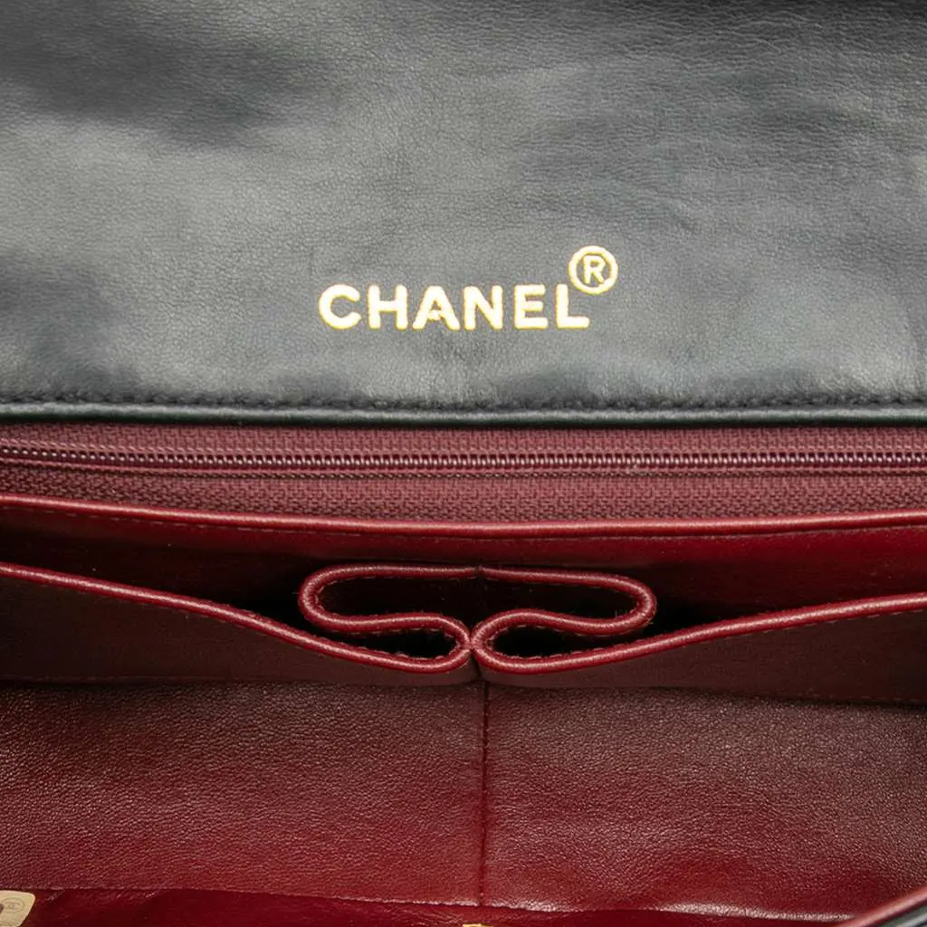 Chanel Medium Quilted Lambskin Full Flap Black Leather Good - Model View