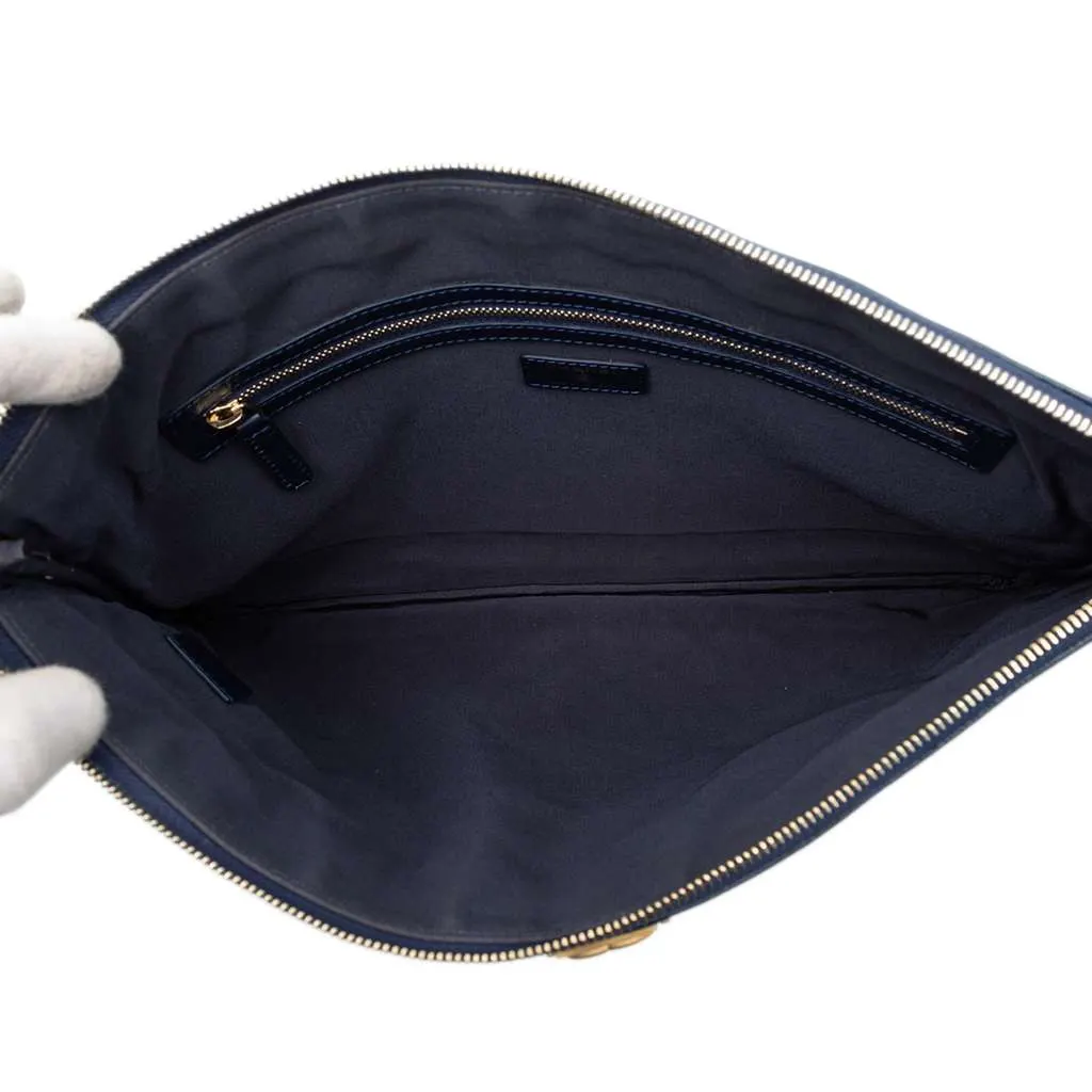 Chanel Large Quilted Caviar Boy O Case Clutch Blue Leather Good - Model View