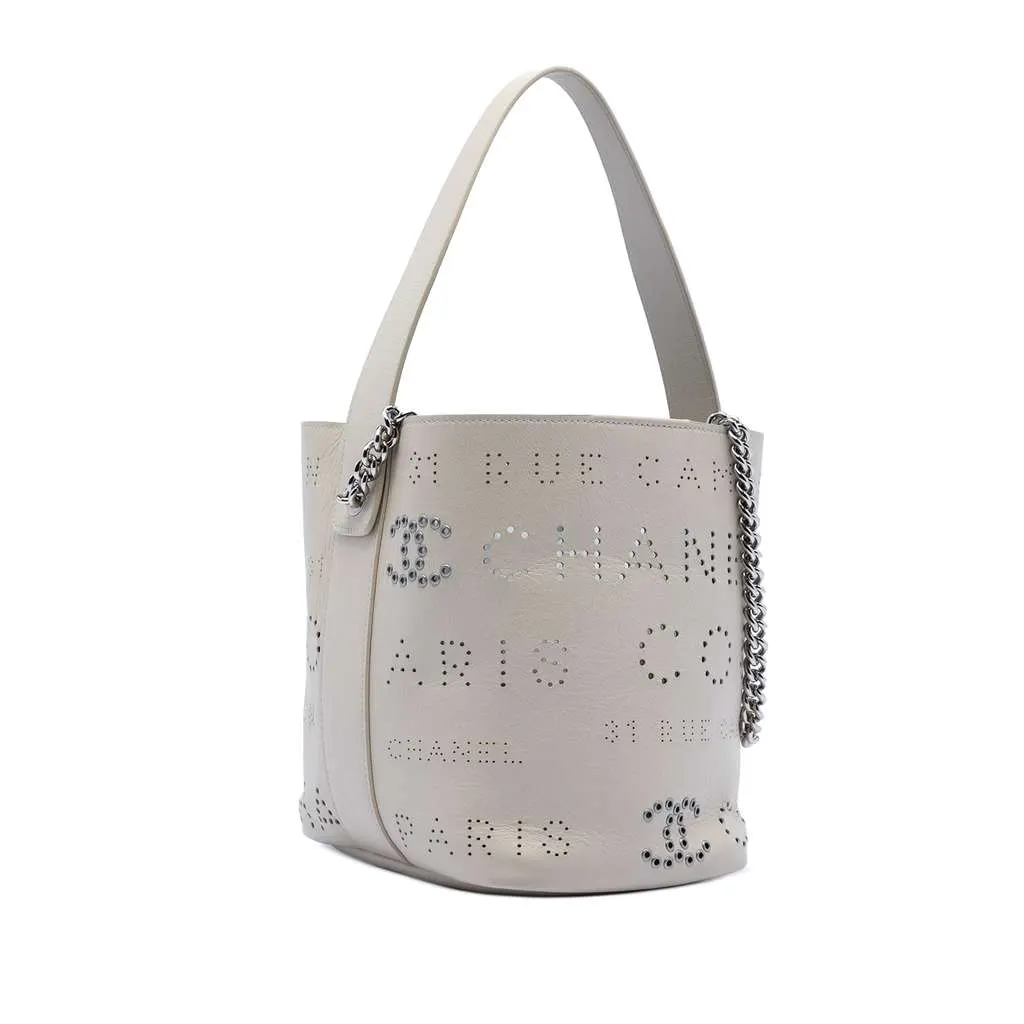 Chanel Small Perforated Calfskin Logo Eyelet Bucket Bag White Leather Very good - Back View