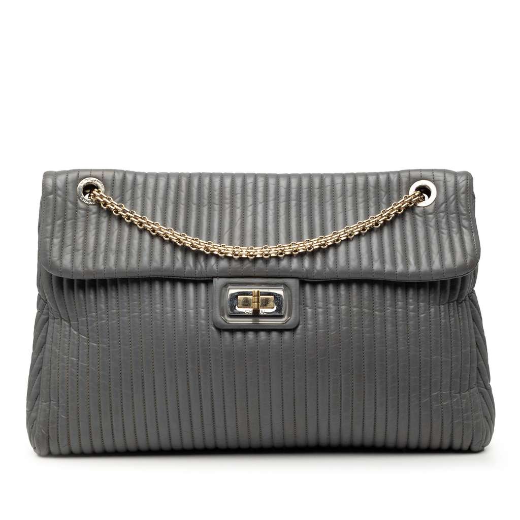 Chanel Vertical Quilted Iridescent Calfskin Mademoiselle Lock Bijoux Flap