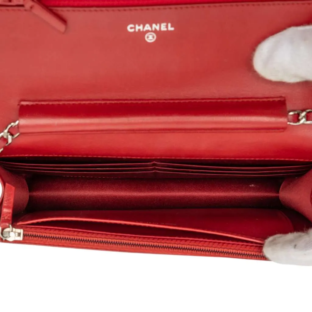 Chanel CC Embossed Lambskin Camellia Wallet On Chain Red Leather Very good - Model View