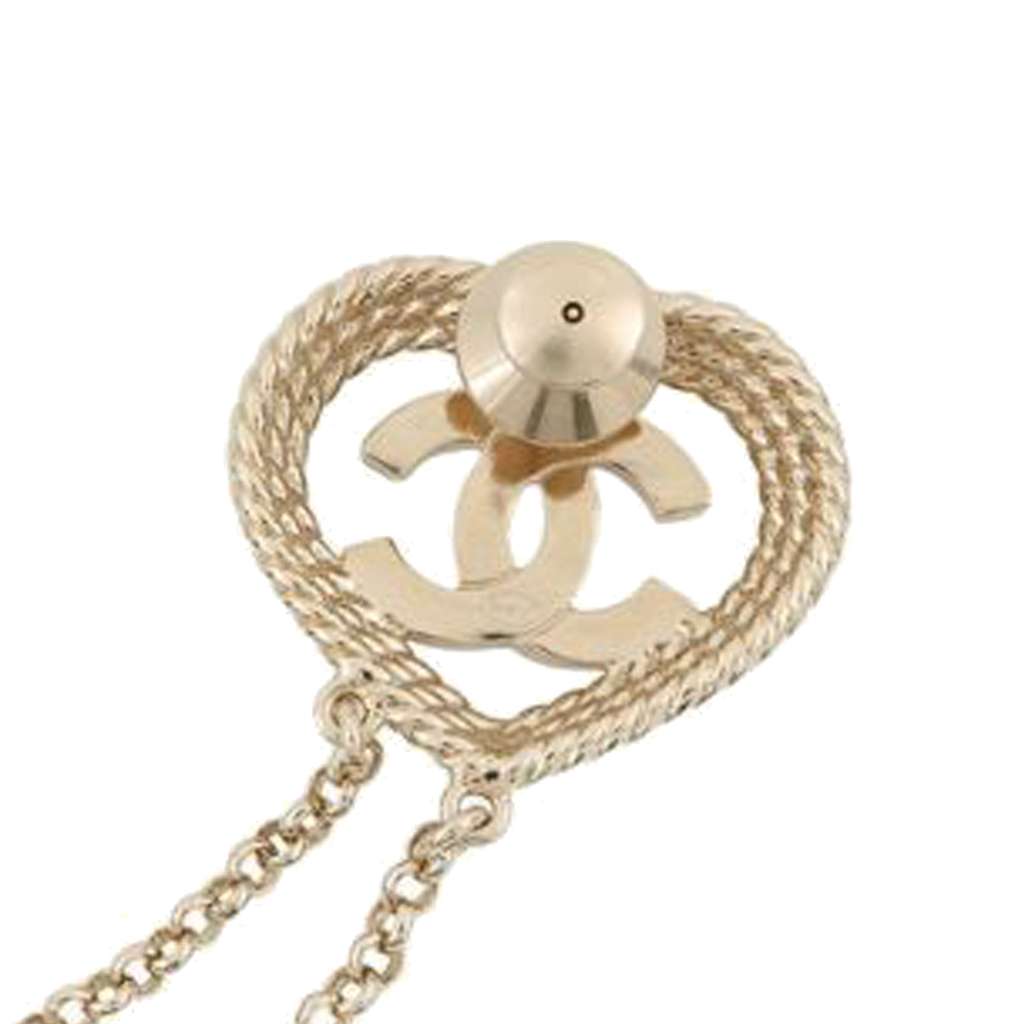 Chanel CC Gold Plated Rhinestone Faux Pearl Heart Star Double Brooch Gold Metal Good condition - Model View