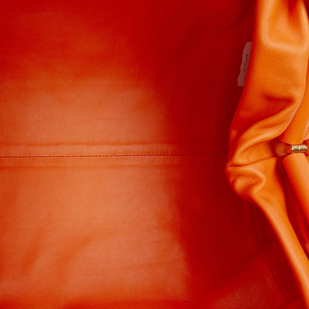Bottega Veneta Lambskin The Pouch Orange Leather Good condition - Model View