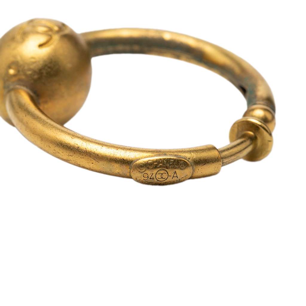 Chanel Gold Plated CC Hoop Earrings Gold Metal Good condition - Model View