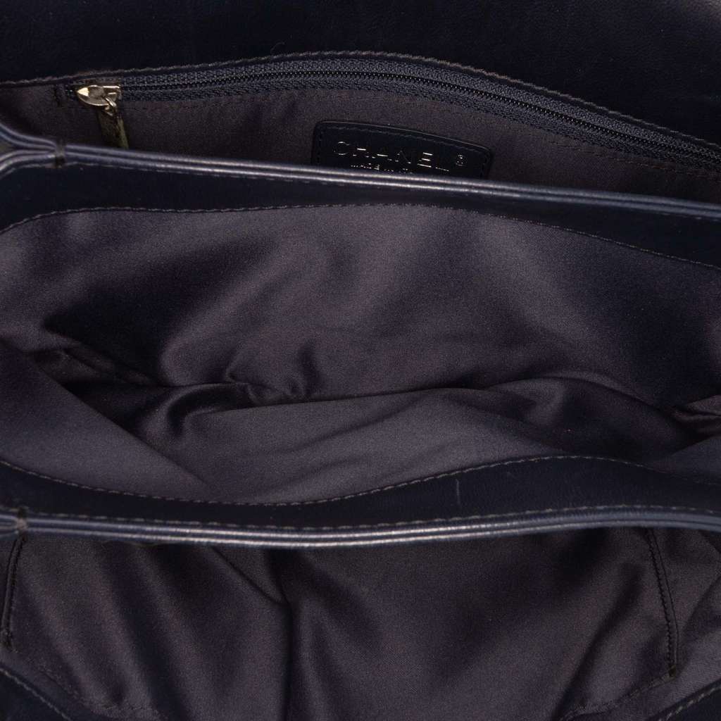 Chanel Medium Quilted Lambskin 3 Accordion Flap Black Leather Good condition - Model View