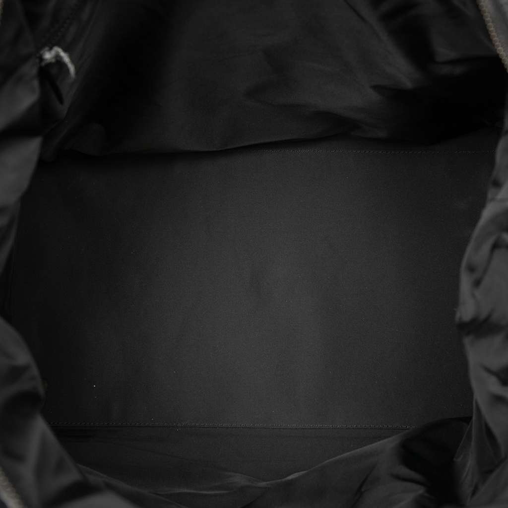 Chanel New Travel Line Nylon Travel Bag Black Good condition - Model View