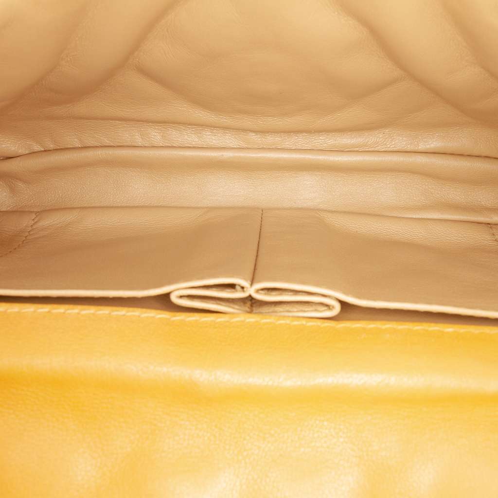 Chanel CC Quilted Lambskin East West Single Flap Orange Leather Good condition - Model View