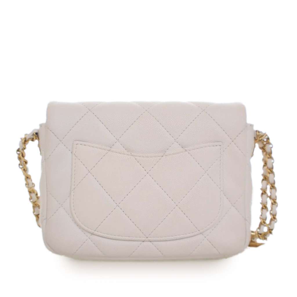 Chanel Mini Quilted Caviar CC Coin Flap White Leather Good condition - Model View